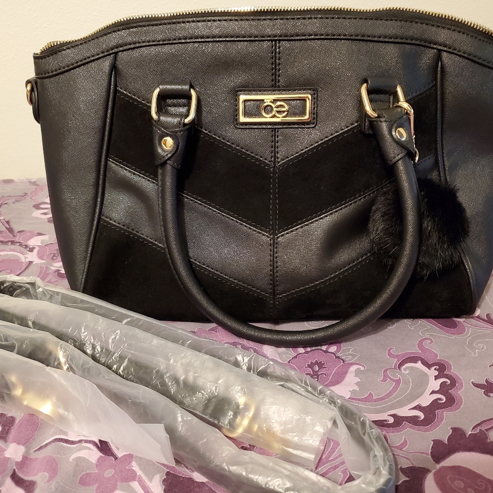 Cloe handbag satchel with detachable strap.